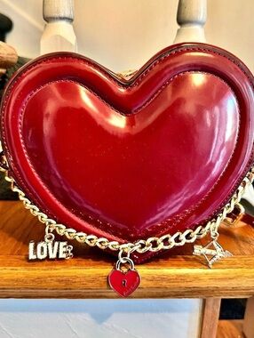 FREE FREE Juicy Couture Heart Crossbody Bag in Red with a $500 purchase.